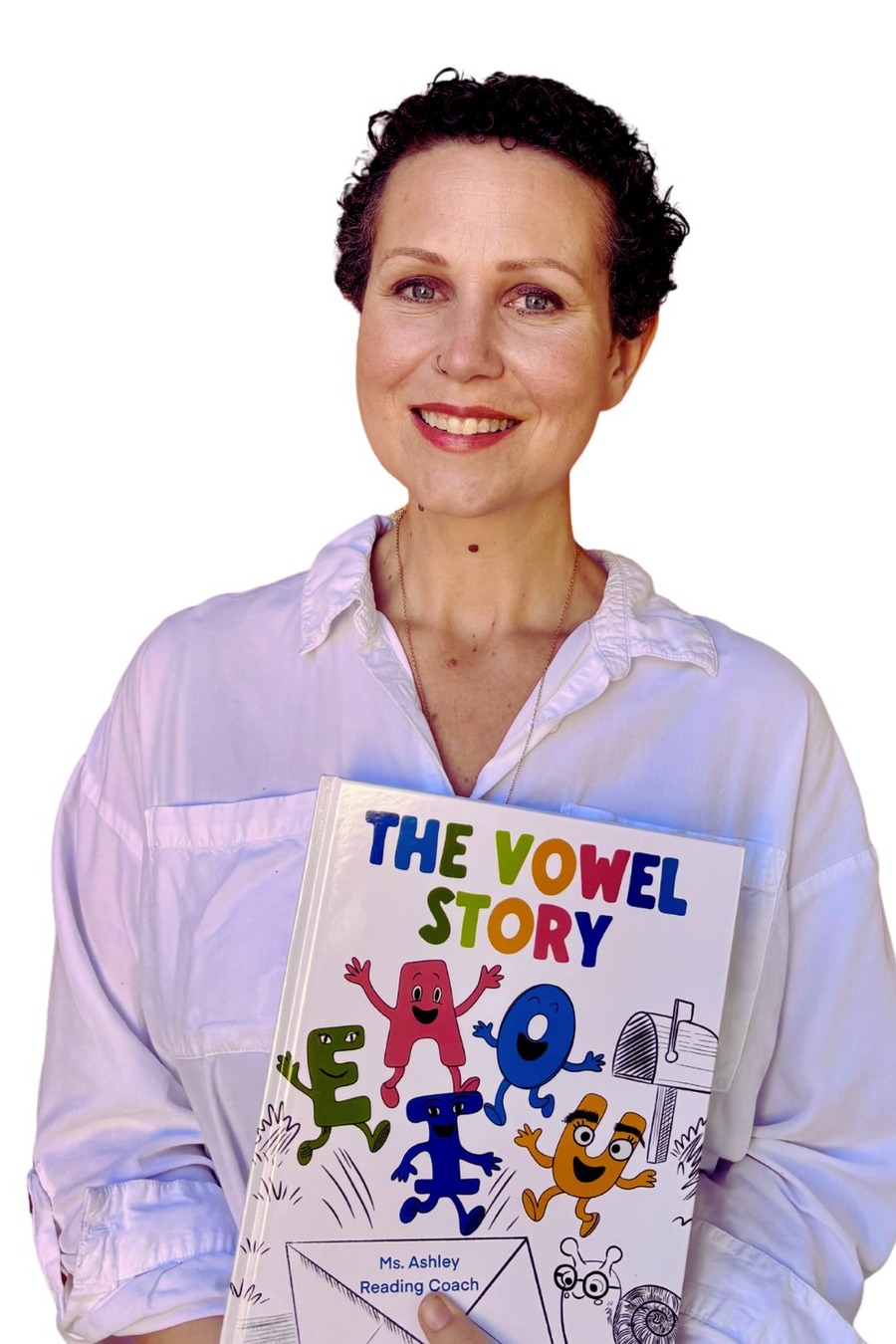 Ashley Testerman holding her book The Vowel Story